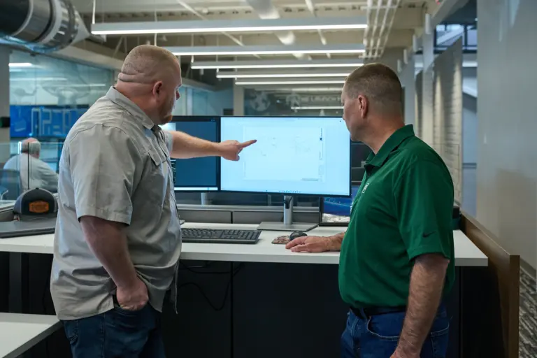 Engineers Collaborating on Design