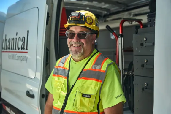 Smiling Technician in Safety Gear(2)