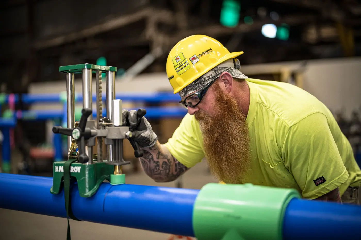 Worker Operating Pipe Tapping Tool